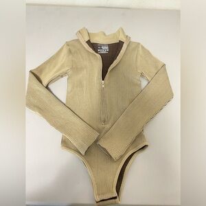 PrettyLittleThing snatched rib zip up long sleeve bodysuit